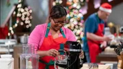 Contestant Hakima Lamour during the first round, The Decorating Challenge, "Christmas Cookies On A Stick", as seen on Christmas Cookie Challenge, Season 2.