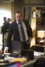 "In The Box" -- When an emotionally distraught man holds Baez hostage at gunpoint in an interrogation room after she served him with a restraining order, Danny must try to meet his demands before he harms her. Meanwhile, Frank is faced with a personal and moral dilemma when Garrett asks for help in dropping charges filed against his son, on BLUE BLOODS, Friday, Feb. 20 (10:00-11:00 PM, ET/PT) on the CBS Television Network. Dominic Fumusa guest stars as an emotionally distraught man. Pictured: MDonnie Wahlberg as Donnie Reagan. Photo: Jeffrey Neira/CBS Ã‚Â©2015 CBS Broadcasting, Inc. All Rights Reserved.