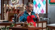 Contestant Brian Grabowski presents his dish Classic Gingerbread, Chocolate Peppermint Crackle Cookies, French Macron with Peanut Butter Buttercream, Hazelnut Spread, and Toasted Marshmellow, during the judging of the second round, The Display Challenge, "Christmas Cookie Train", as seen on Christmas Cookie Challenge, Season 2.