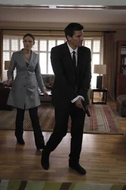 Brennan (Emily Deschanel, L) and Booth (David Boreanaz, R) investigate the home of a dentist whose skeleton is found buried at a Civil War reenactment site in the BONES episode "The Dentist in the Ditch"