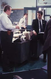 L-R George Dzundza as Detective Maxwell "Max" Greevey, Chris Noth as Detective Mike Logan