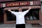 Buddy Valastro in front of his family owned bakery Carlo's City Hall Bake Shop in Hoboken, NJ as seen on Cake Boss.