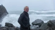 Extreme fisherman Jeremy Wade against dramatic backdrop of the choppy Atlantic sea