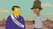 Was passiert nur mir Springfield? Bürgermeister Quimby (l.) ist ratlos: Nicht mal Pharrell Williams (r.) kann ihm helfen, ein Lied für die Stadt zu finden ...