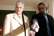 LAW & ORDER -- NBC Series -- "Invaders" -- Pictured: (l-r) Dennis Farina as Fontana, Jesse L. Martin as Green, Tyrone Grant as Alphonse, Therisa Spruill as Woman in bed -- NBC Photo: Will Hart