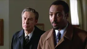 L-R Detective Lennie Briscoe( Jerry Orbach) , Detective Ed Green (Jesse L. Martin)