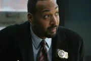 Detective Ed Green (Jesse L. Martin)