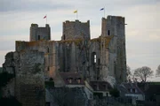 Old medieval castle in ruins at dusk in Bourbon l'Archambault, France