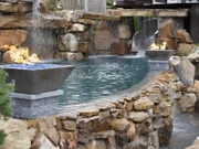 Completed pool, with slide and fire features