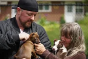 Eric Lenhard and mother Lori Mason get to know newly adopted Little Bears Honey and Teddy