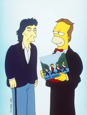 Damals hatte Homer (r.) zusammen mit Rektor Skinner, Apu und Barney als "Barbershop-Quartett" den Grammy gewonnen und von George Harrison (l.) überreicht bekommen.