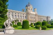 Beautiful view of famous Naturhistorisches Museum (Natural History Museum) with park and sculpture on a sunny day with blue sky in summer, Vienna, Austria