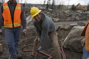 USA, Washington, Monroe, Host Mike Rowe works with Brandon Babka, the site's Master Blaster, during Dirty Jobs shoot at Five Mile Quarry