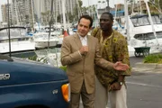 L-R: Adrian Monk (Tony Shalhoub), Samuel Waingaya (Adewale Akinnuoye-Agbaje )