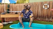 Antonio Ballatore with dog and pool