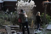 Corey hugging father.