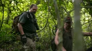 Cork Graham and Jeremy Whalen trek through the jungle.