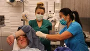Dr. Sandra Lee performs surgery to remove Gerard’s bumps on his arms with the help of Medical Assistant Kristi.