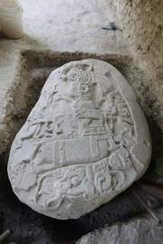 La Corona, Peten District, Guatemala - Carvings on a nearly 1500 year-old Maya altar, showing a local King believed to have played a key role in the rise of a Maya dynasty known as the Snake Kings.