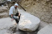 La Corona, Peten District, Guatemala - National Geographic explorer Marcello Canuto (Tulane University) inspects a near 1500 year-old ritual altar discovered at the ancient Maya city of La Corona in Guatemala.