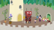 Der Spielzeugroboter soll im Schloss beim Putzen helfen.