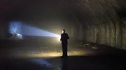 MiG-Kampfpilot Hasan Imamovi? in den Höhlen des ehemaligen jugoslawischen Militärflugplatzes Željava. Für diesen Stützpunkt wurden 3,5 Kilometer Tunnel in den Berg gesprengt.