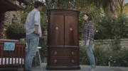 Jenny and Hal debate if they should purchase the antique wardrobe for her new house.