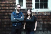 Nick Groff and Katrina Weidman stand in front of Oliver Estate.