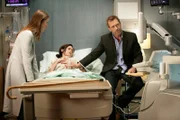 HOUSE -- "Dying Changes Everything" Episode 501 -- Pictured: (l-r) Olivia Wilde as Dr. Remmy Hadley/ Thirteen, Christine Woods as Lou, Hugh Laurie as Dr. Greg House -- NBC Photo: Adam Taylor