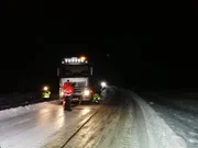 Overhalla, Norway - Icy road in Overhalla. A truck has problems and needs to be rescued by Jo Roger and his team.