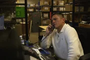Officer Mario Cebrera answers the office phone. (National Geographic/Lucky 8 TV)