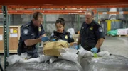 CBP Agriculture Specialists examine a suspicious green powder at Miami International Airport. (National Geographic/Lucky 8 TV)