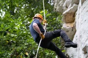 Puerto Rico - Gordon Ramsay repelling on a sheer rockface in a rainy forest in Puerto Rico. (Credit: National Geographic/Justin Mandel)