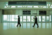 Officer Tai and Officer Lopez make their way to an arriving flight at Terminal 4.(National Geographic/Lucky 8 TV)