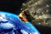 3D-Rendering eines Meteoriten- oder Asteroidenschwarms, der in die Erdatmosphäre eintritt.