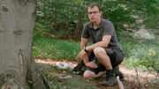 Biologe Paul Lippitsch erklärt seine Arbeit am deutsch-tschechischen Wolfsmonitoring-Projekt