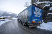 A 22-ton truck carrying concrete is stuck on a narrow, winding road. The wheels are in the ditch, and the trailer is smashed into the mountain wall. Due to the truck driver, he had to drive into the ditch to avoid oncoming traffic.  (National Geographic/ITV Studios Norway AS)