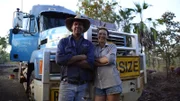 Nick and Jo in front of truck at unload station in Kandiwal