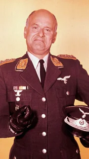 Colonel Wilhelm Klink (Werner Klemperer)