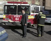 "Indelible" -- Mac Taylor (Gary Sinise) arrives at the site of the World Trade Center attacks on Sept. 11, 2001 in a flashback on the eighth season premiere of CSI: NY, Friday, Sept. 23 (9:00-10:00 PM, ET/PT) on the CBS Television Network. Photo: Richard Cartwright/CBS ©2011 CBS Broadcasting Inc. All Rights Reserved.
