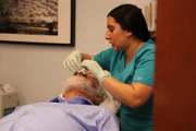 A medical assistant examining David‚Äôs nose.