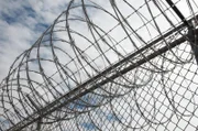 El Paso, TX: A close up of the barbed wire fence that lines the border.
