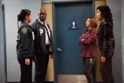 Pictured: (l-r) Melissa Fumero as Amy Santiago, Andre Braugher as Ray Holt, Chelsea Peretti as Gina, Stephanie Beatriz as Rosa Diaz