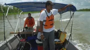 Kamau Sadiki, collaborator on the Slave Wrecks Project and Lead Instructor at Diving With A Purpose, sets off to dive on the Clotilda wreck site. (National Geographic/Daniel Fiore)