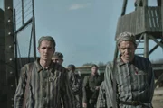 Jonah Hauer-King as Lali Sokolov & Adam Karst as Pepan in Auschwitz.