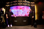 Wayde King and Brett Raymer with custom built Kiss fish tank found within the Kiss Monster Mini Golf Course in Las Vegas, Nevada.Wayde King and Brett Raymer from Acrylic Tank Manufacturing stand next to the custom built Kiss fish tank found within the Kiss Monster Mini Golf Course in Las Vegas, Nevada.