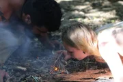 Justin and Maci making fire.