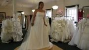 Aya trying on a wedding dress.