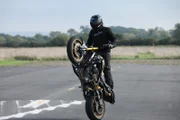 Dunsfold, Guildford, UK: A motorbiker pulling a wheelie. (Photo Credit: National Geographic Channels)