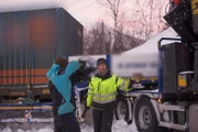 FINNSNES, Norway - Frank Sebulonsen, tow truck driver, talking to the camera.